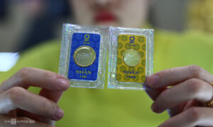 Giá vàng lùi về 185 triệu đồng